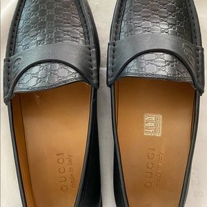 Black Gucci driving shoes
